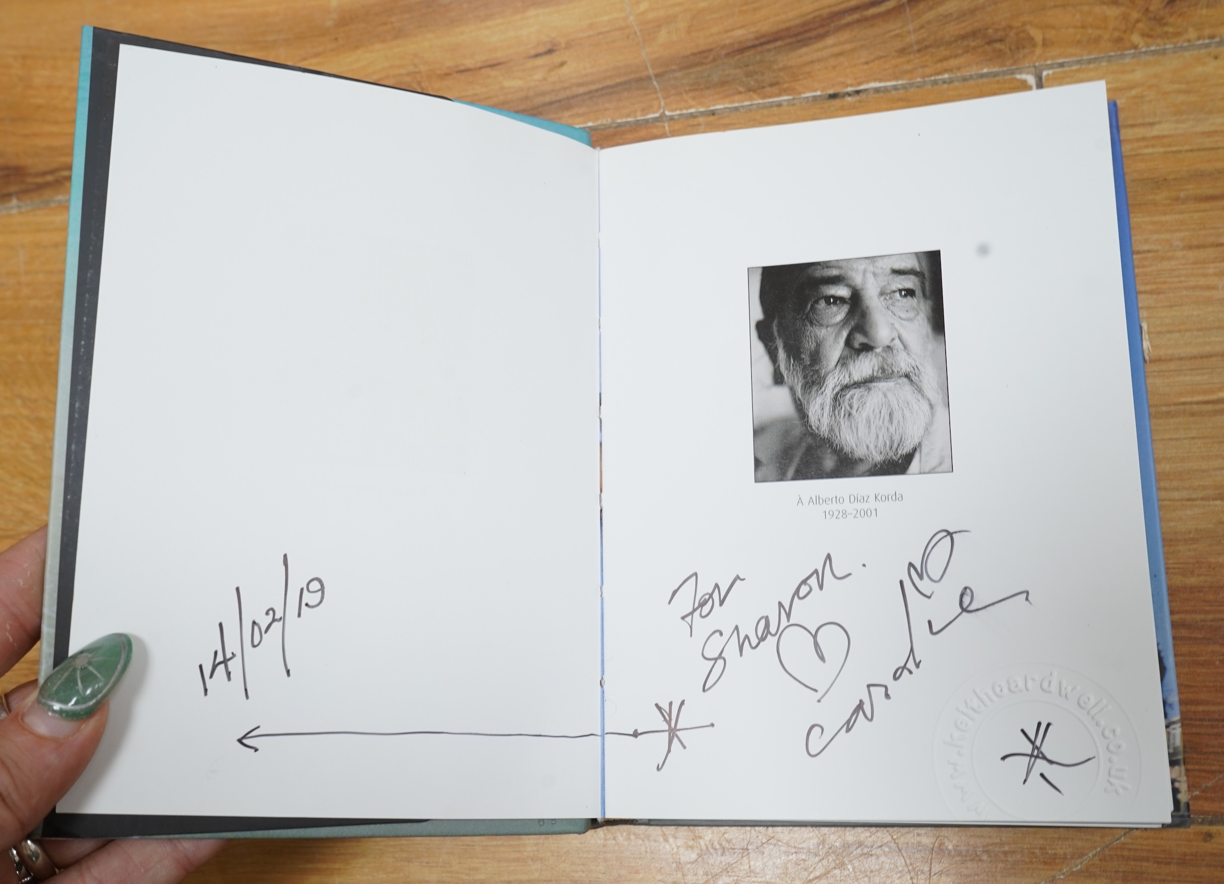 Keith Cardwell (Contemporary), Three gelatin silver prints to include ‘Old Man and the Sea, Cuba’, stamped, signed and titled in ink to the margin and ‘Korda with his Che’, stamped, largest 25 x 17cm, together with a boo